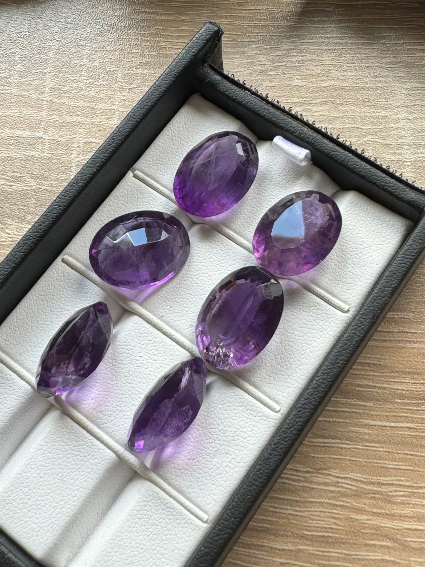 Amethyst Oval Faceted Gemstones With Deep Purple And Inclusions