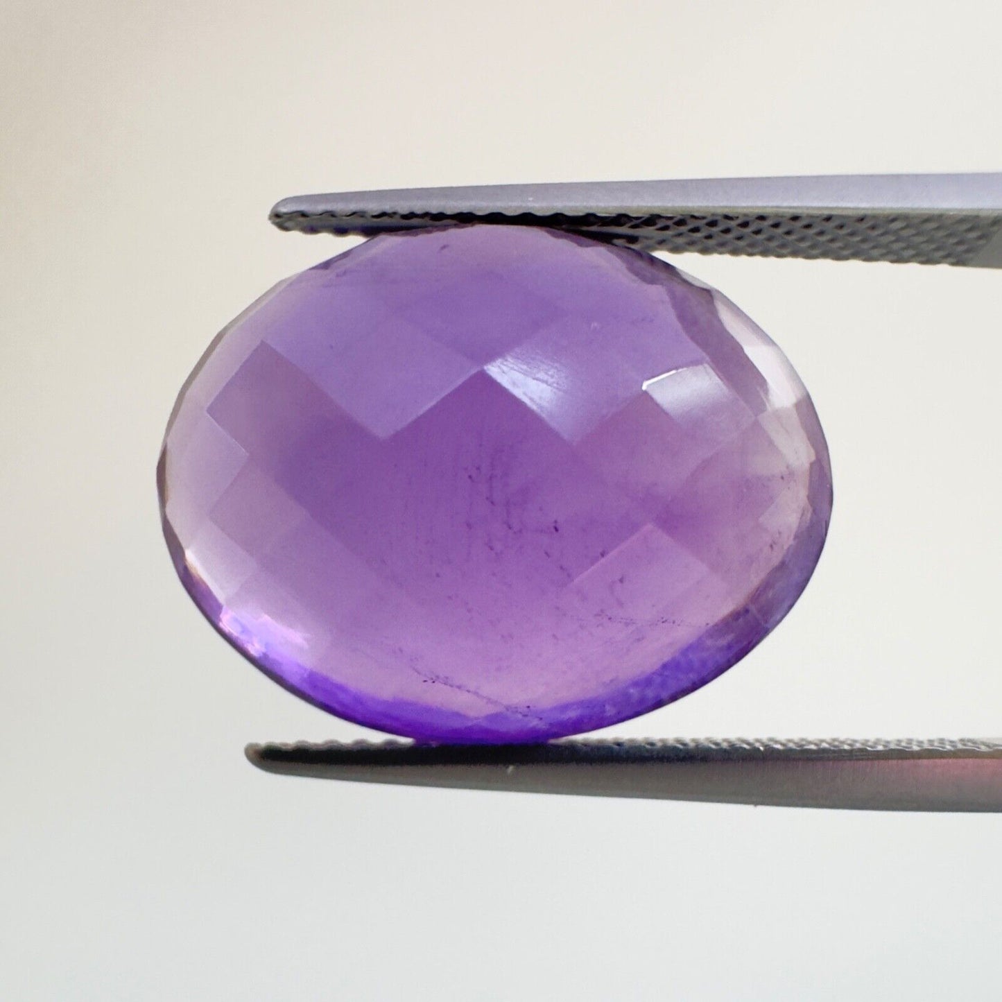 Amethyst Purple Oval Cut Faceted 18.6 x 14.6 mm 15.12 Carat With Inclusions