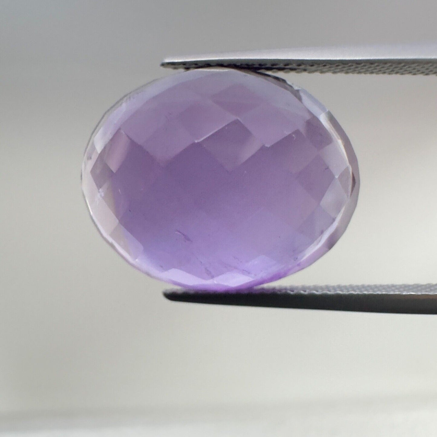 Amethyst Purple Oval Cut Faceted 20,3 x 16 mm 20,51 Carat With Inclusions