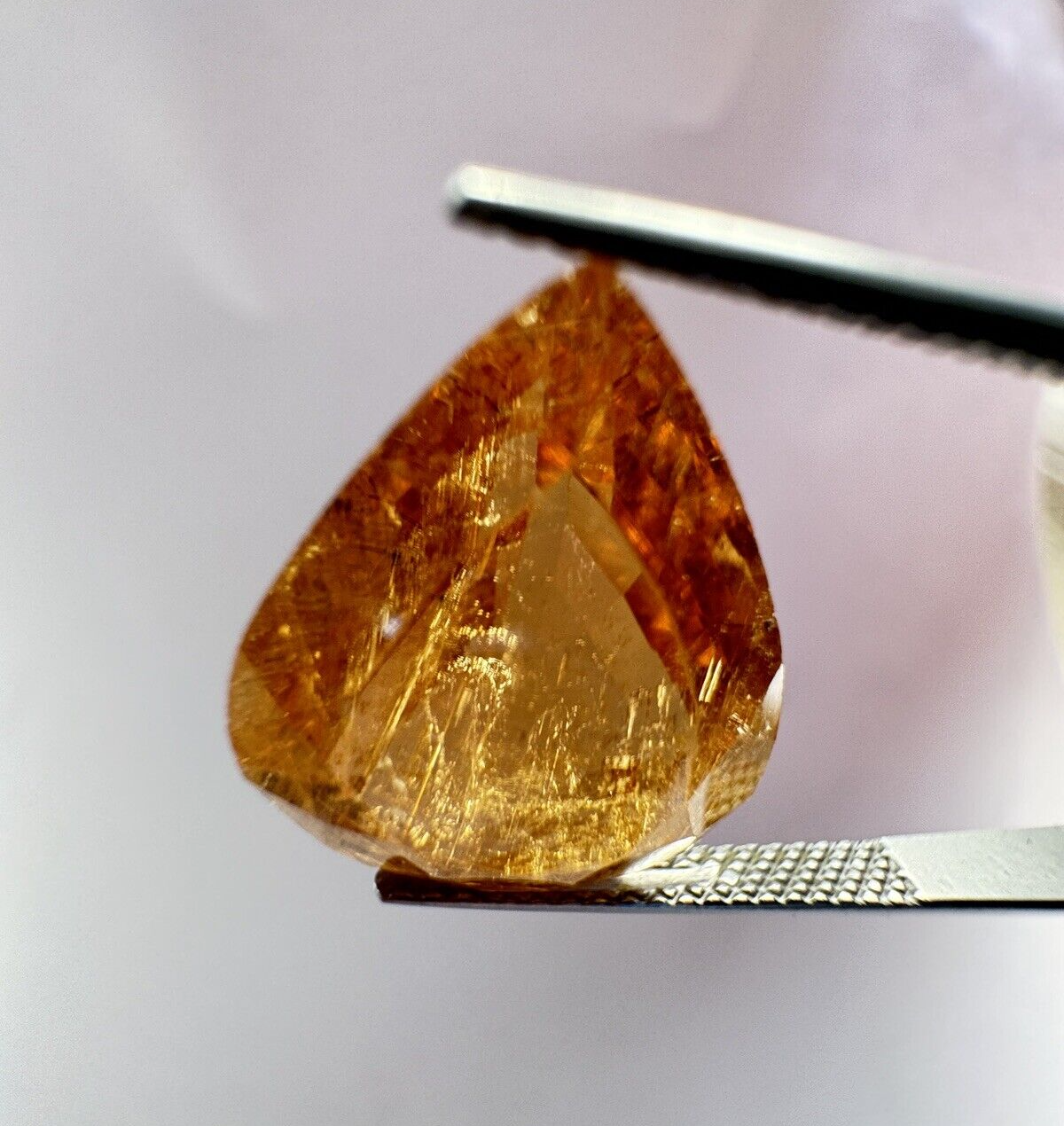 Warm orange tourmaline 16,02mm x 13,81mm 11,14cts