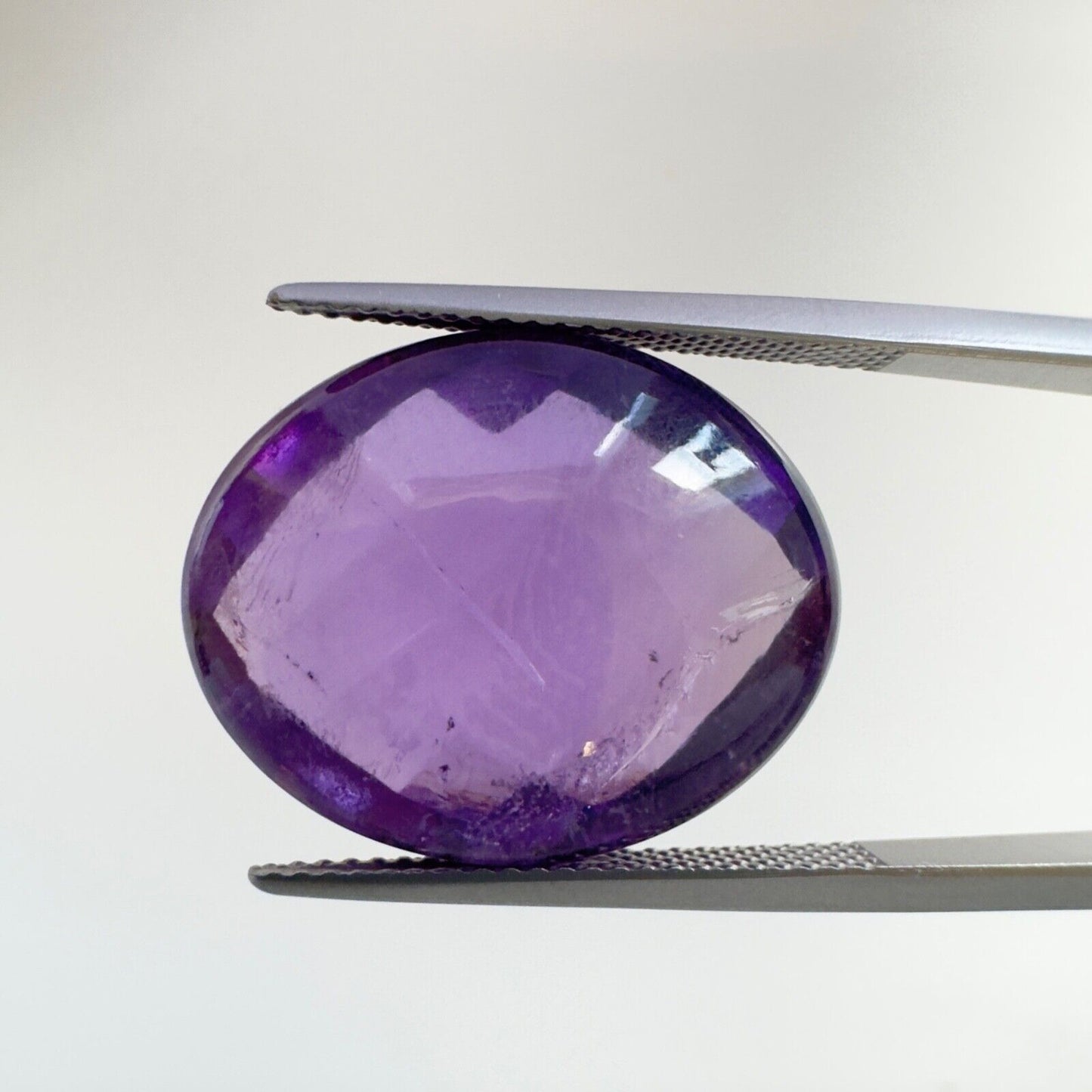 Amethyst Purple Oval Cut Faceted 18.6 x 14.6 mm 15.12 Carat With Inclusions