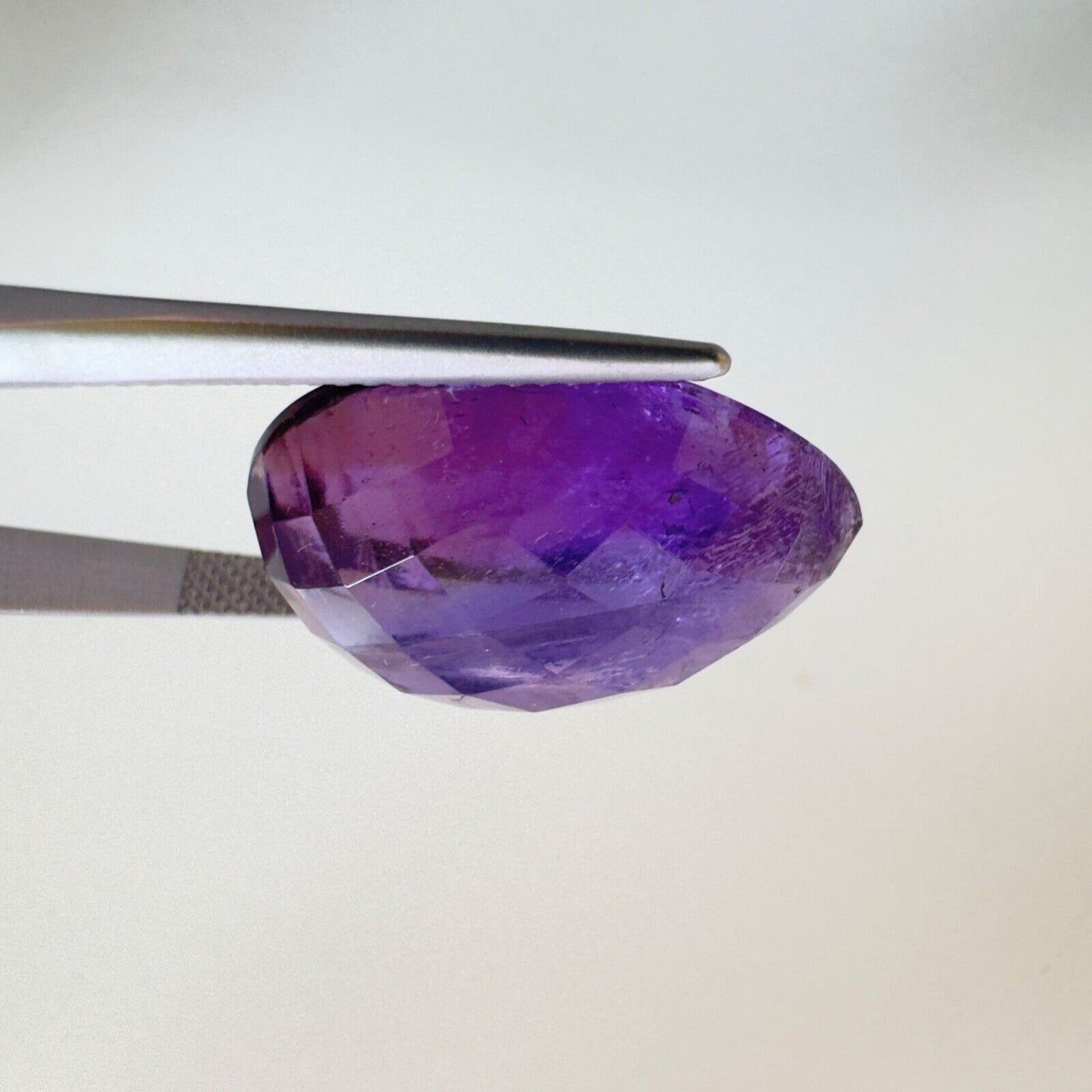Amethyst Purple Drop Cut Faceted 22.3x16.2mm 22.14 Carat With Inclusions