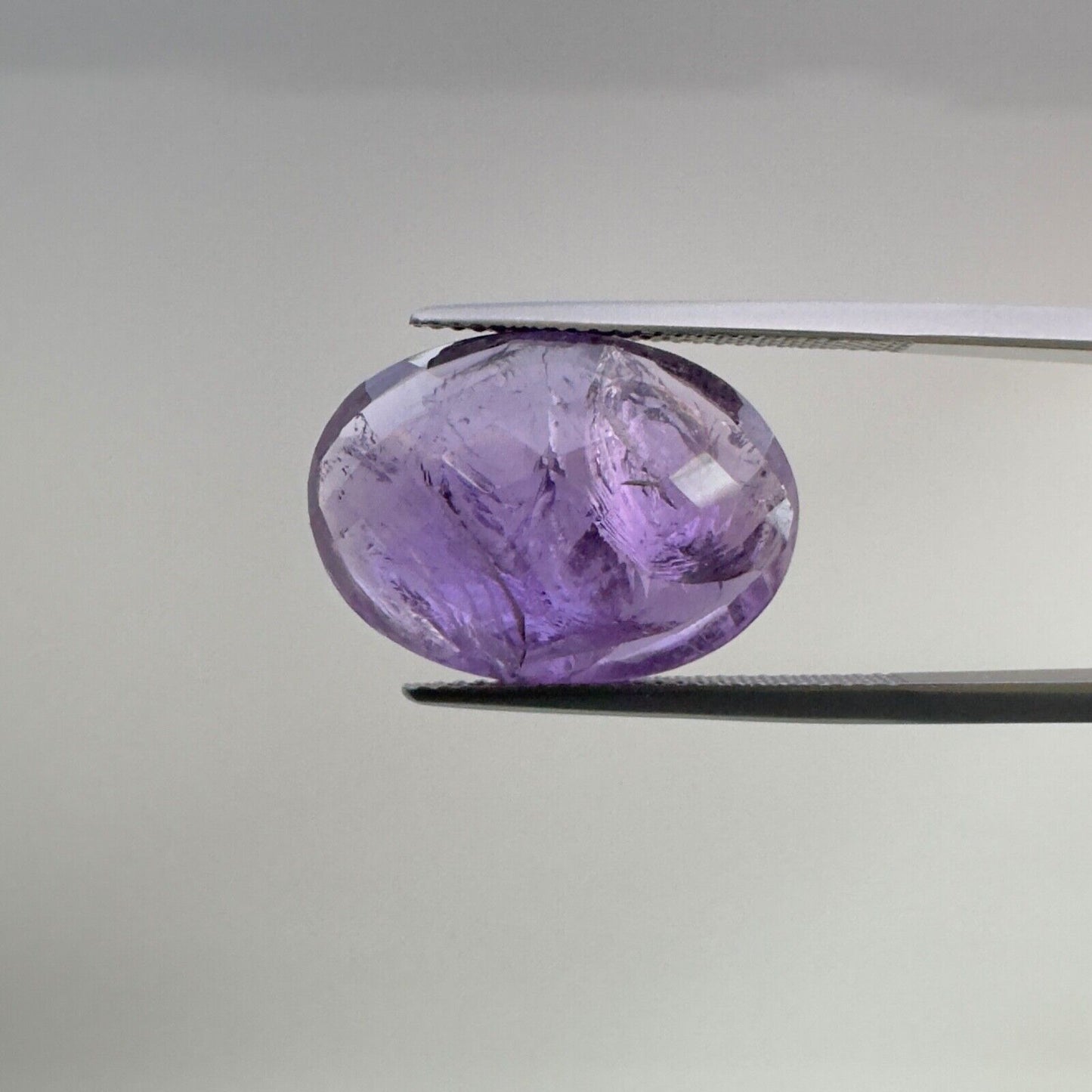 Amethyst Purple Oval Cut Faceted 19,7x14.2mm 14,95 Carat With Inclusions