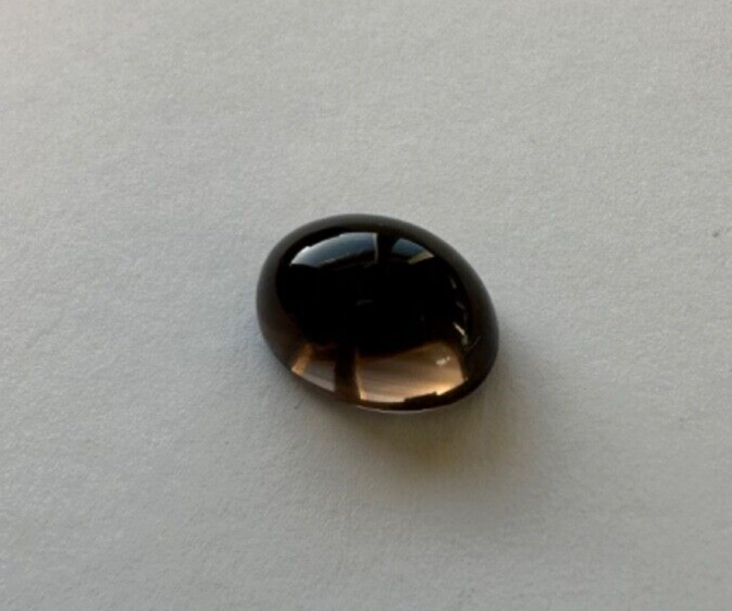 Magical smoked quartz cabochon 16mm x 12 mm 11,36cts