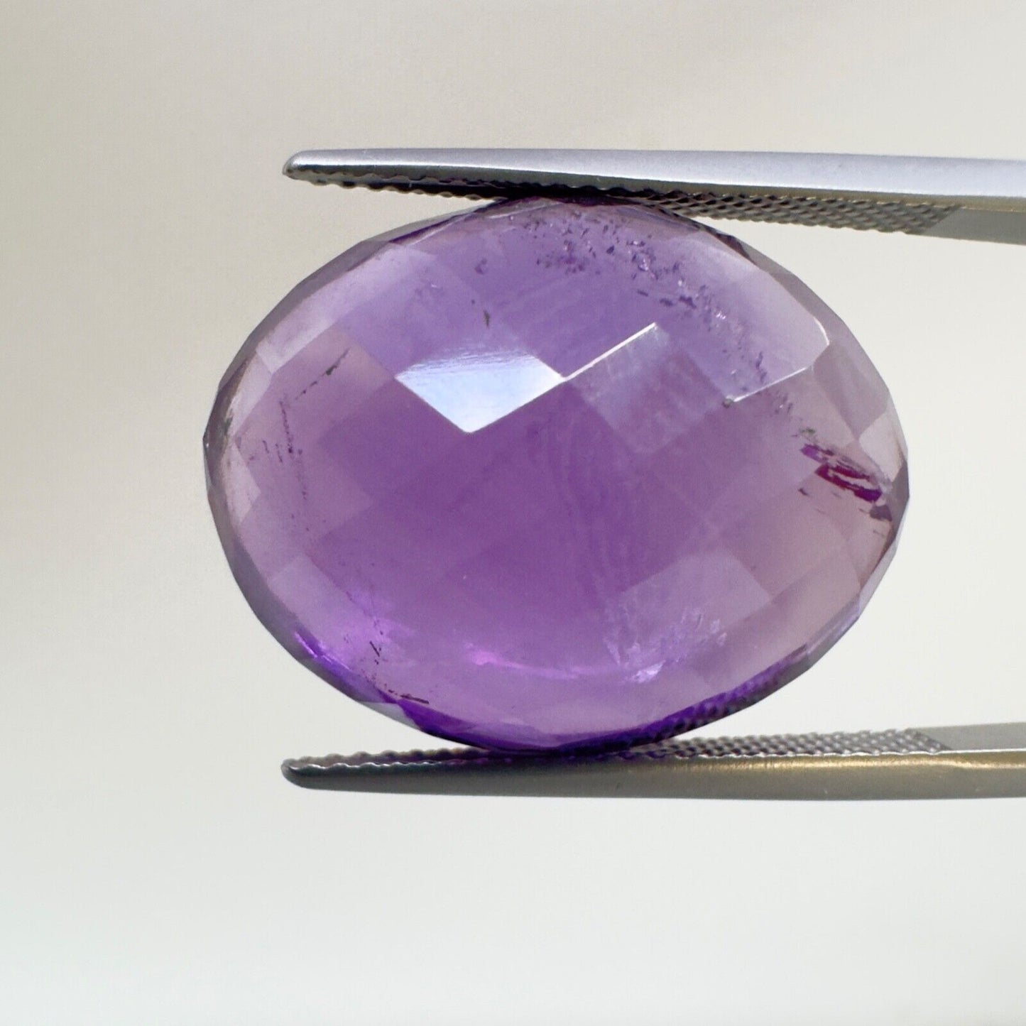 Amethyst Purple Oval Cut Faceted 18.6 x 14.6 mm 15.12 Carat With Inclusions