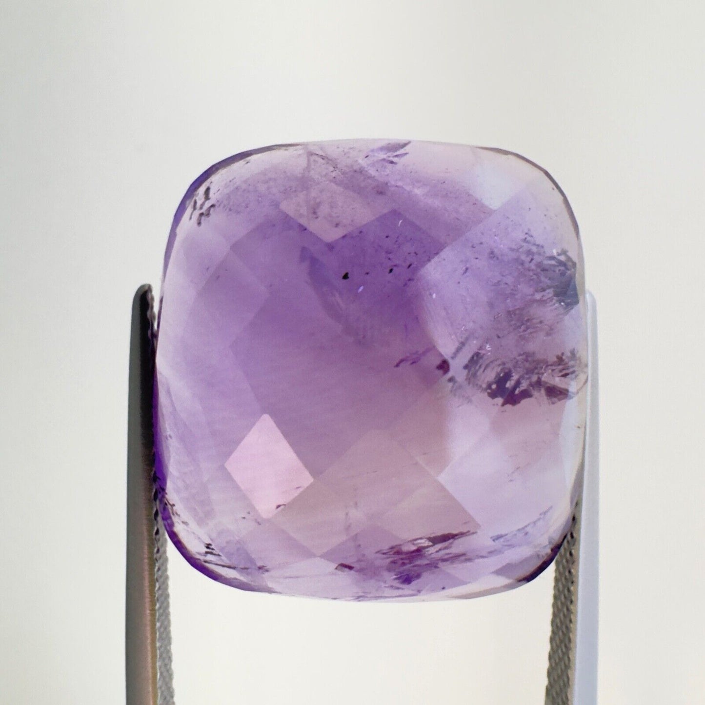 Amethyst Purple Cushion Cut Faceted 21 x 19,5 mm 31,77 Carat With Inclusions