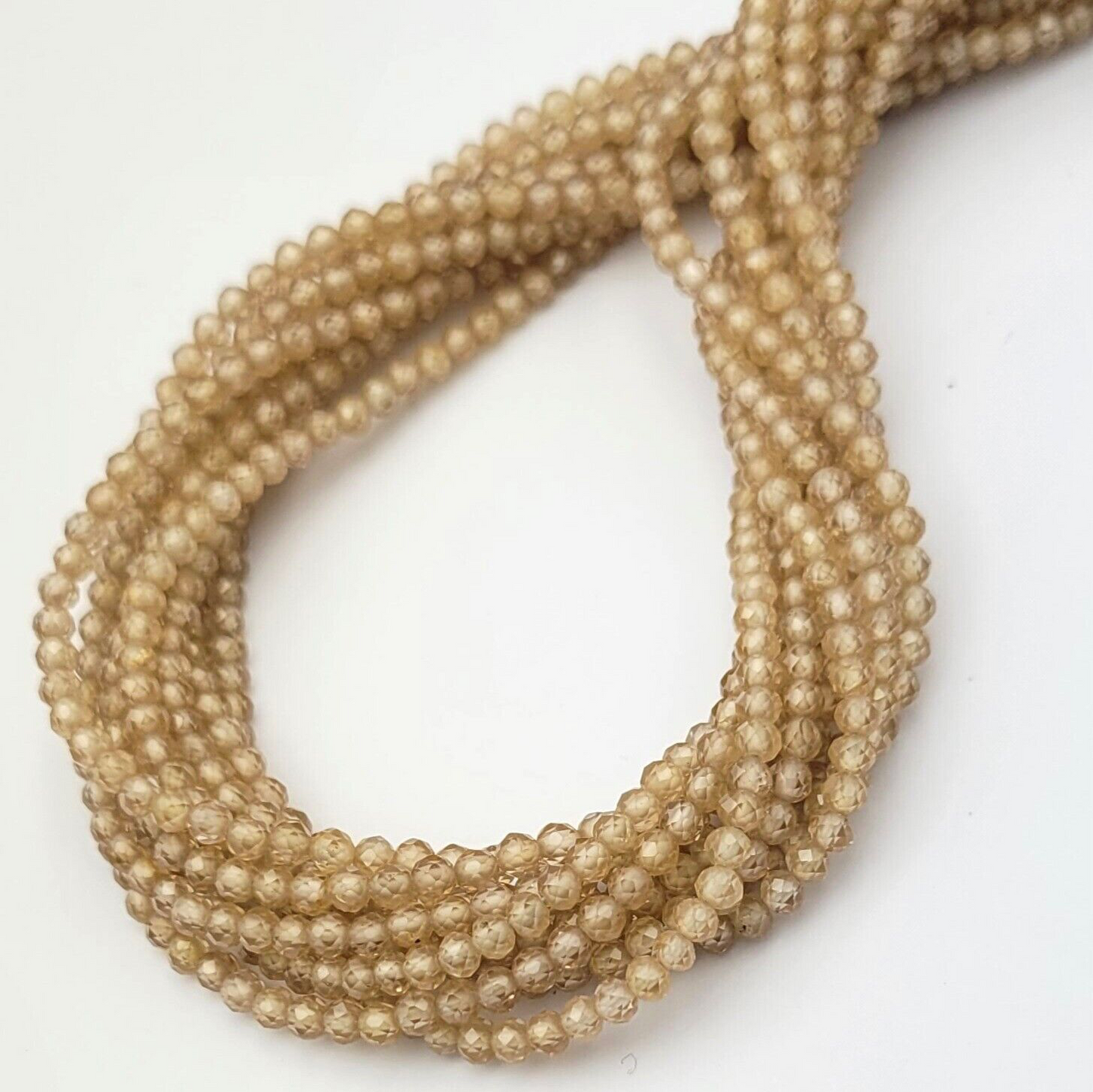 1 strand AAA+ Brown Champagne Zercon Faceted Roundel 3.2-3.3 mm Beads 42Cm