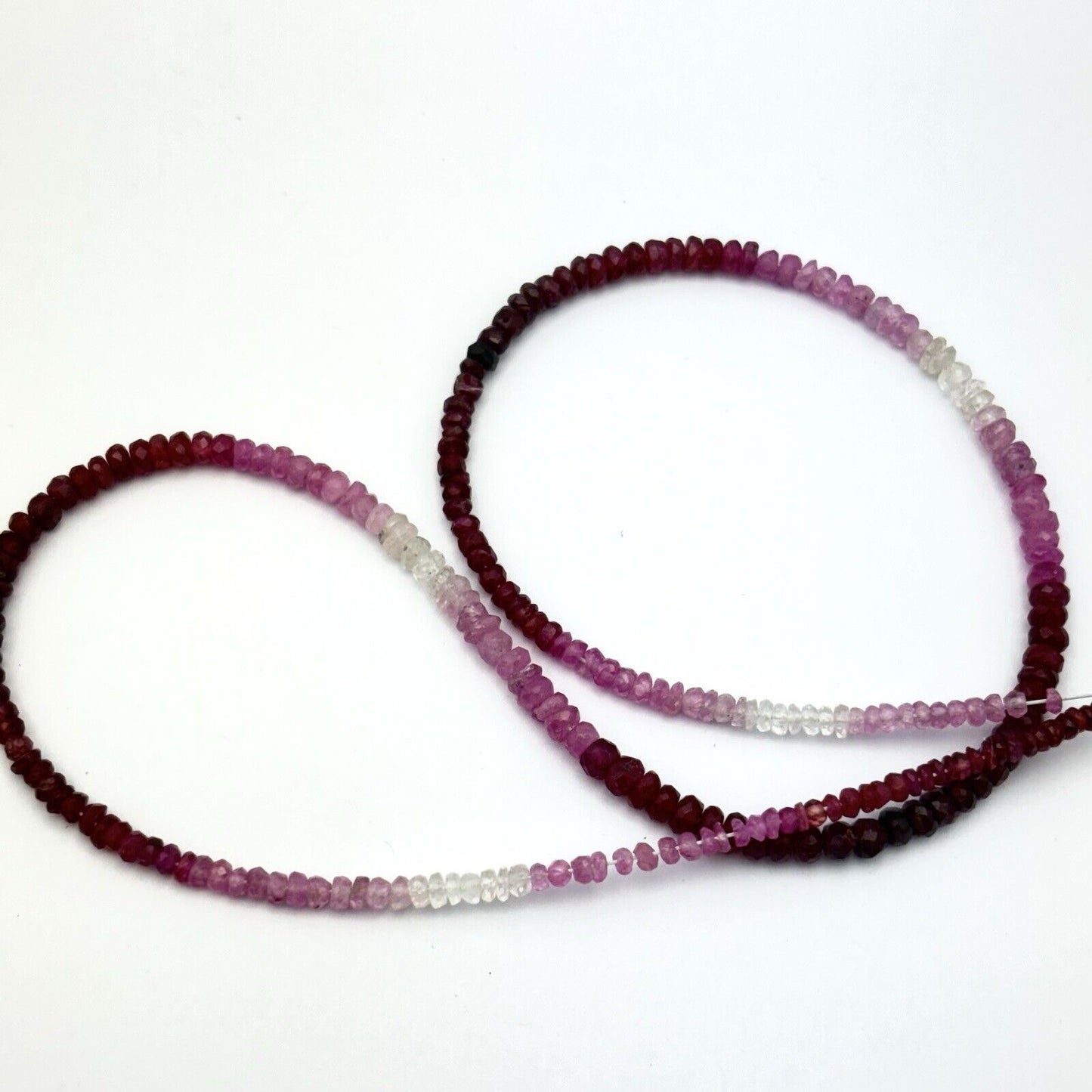 Delicate sapphire necklace faceted with gradient light pink to wine red