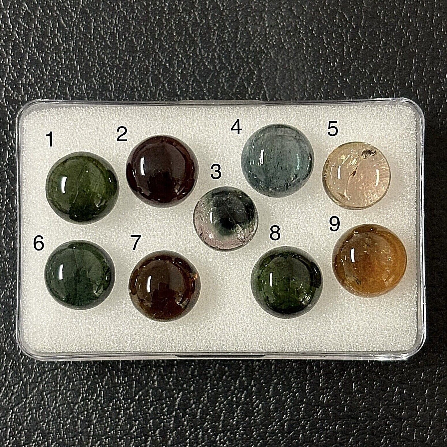 Tourmaline Round Cabochon With Inclusions Approx. 9-9.8 mm 3.77 Cts.