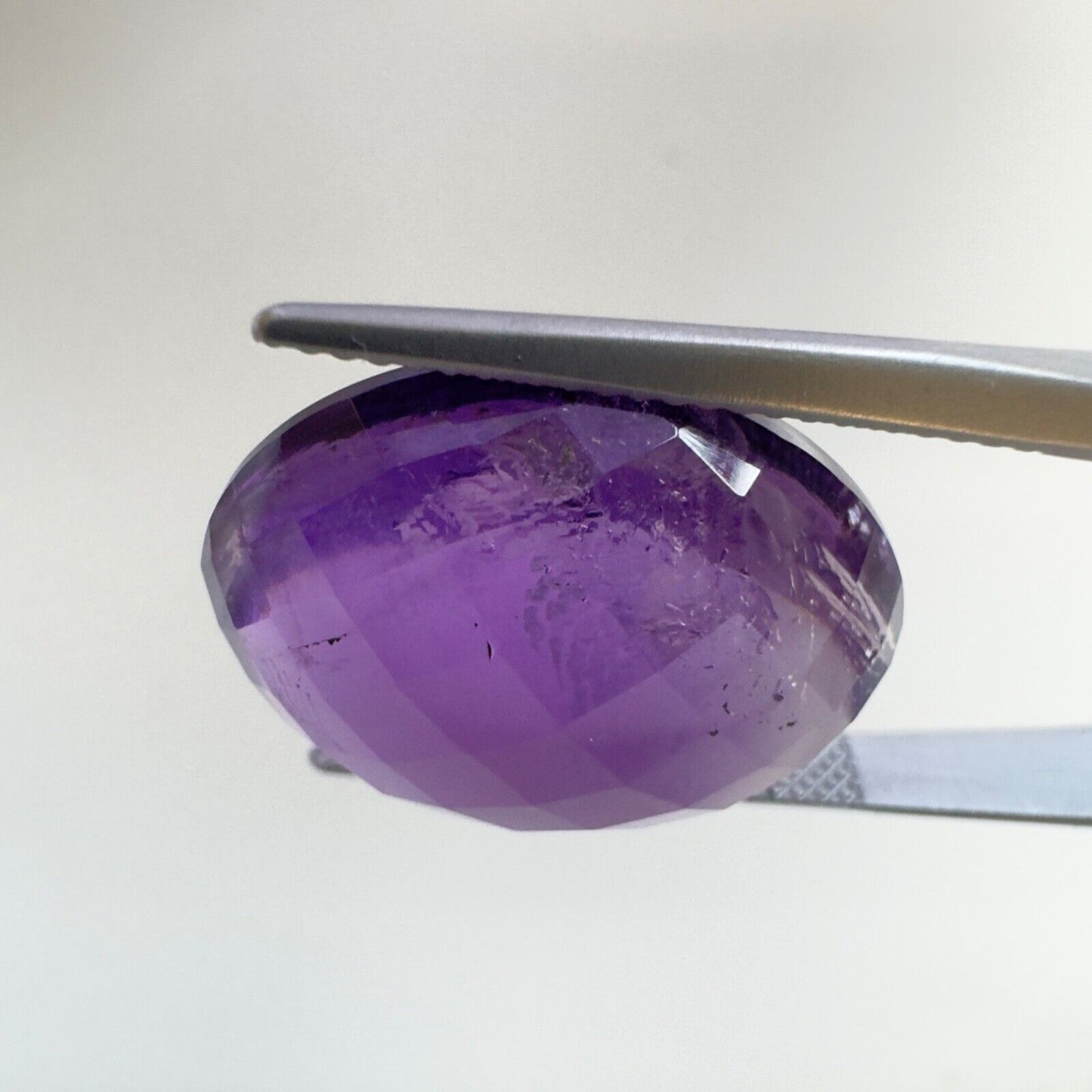 Amethyst Purple Oval Cut Faceted 18.6 x 14.6 mm 15.12 Carat With Inclusions
