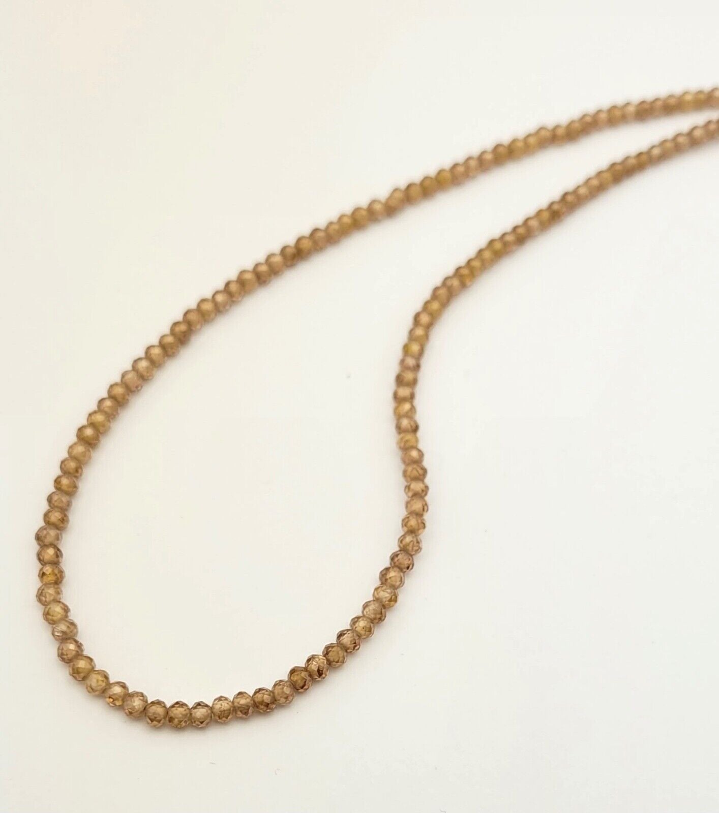 1 strand AAA+ Brown Zikonia Faceted Roundet 3.5 - 3.6 mm Beads 43 Cm