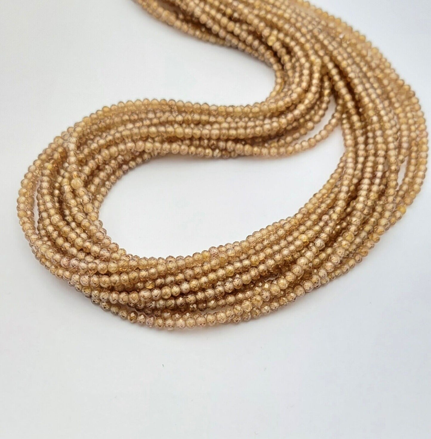 1 strand AAA+ Brown Zikonia Faceted Roundabout 2.8 - 2.9 mm Beads 43 Cm