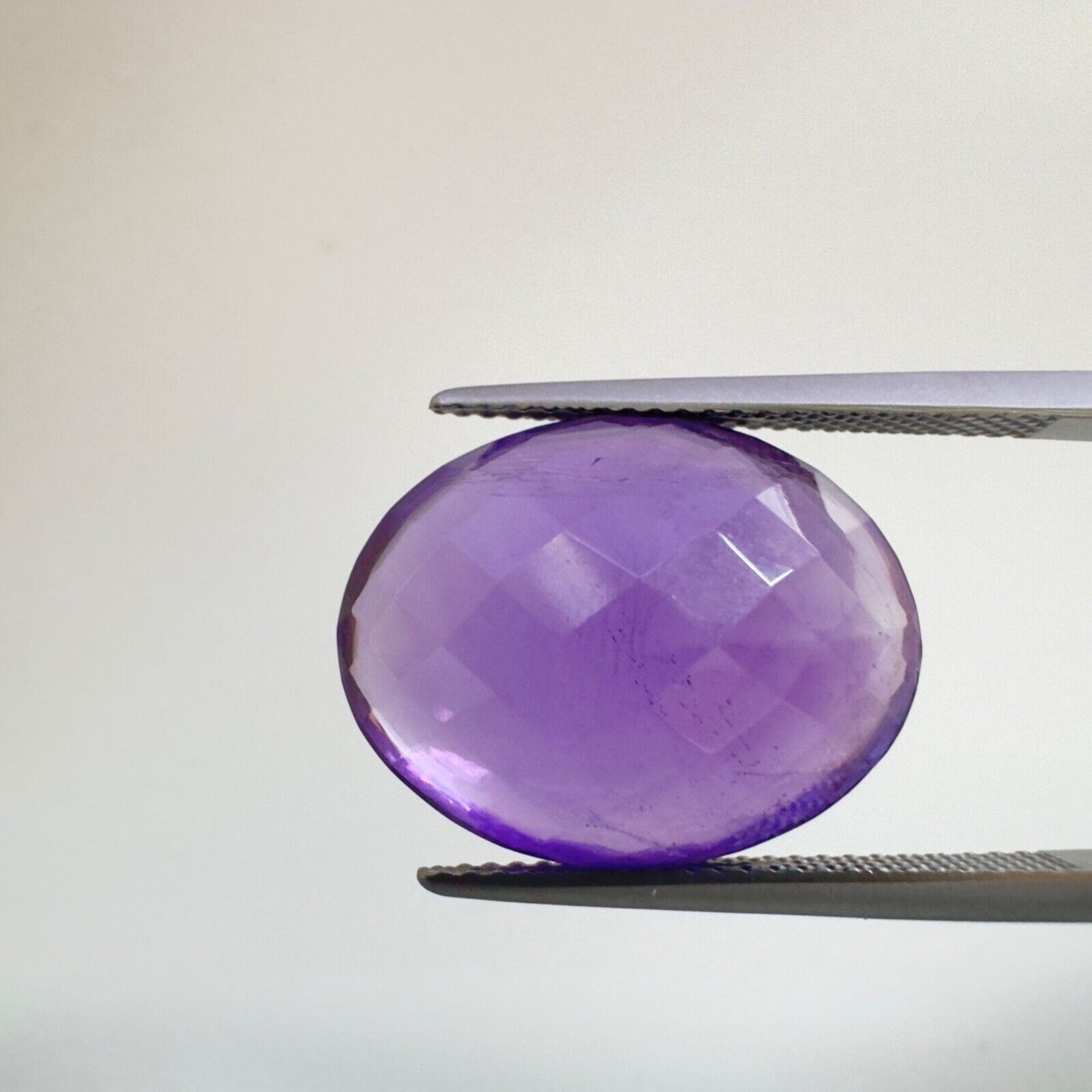 Amethyst Purple Oval Cut Faceted 18.6 x 14.6 mm 15.12 Carat With Inclusions