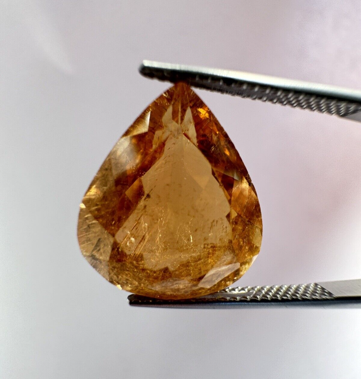 Warm orange tourmaline 16,02mm x 13,81mm 11,14cts