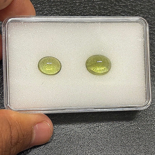 1 Stück grüner Peridot ovaler Cabochon mit Einschlüssen