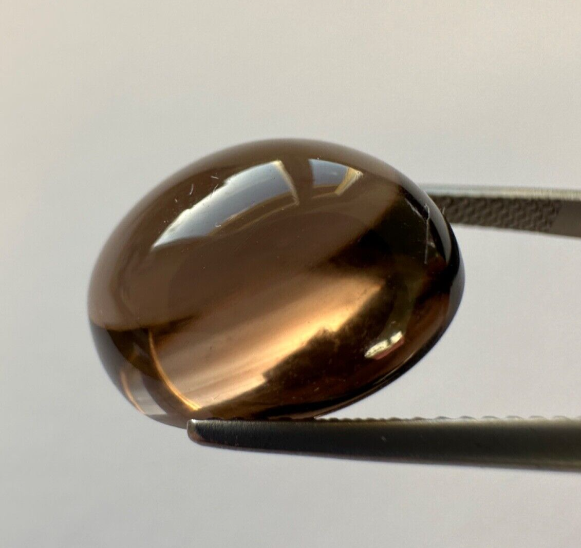 Magical smoked quartz cabochon 16mm x 12 mm 11,36cts