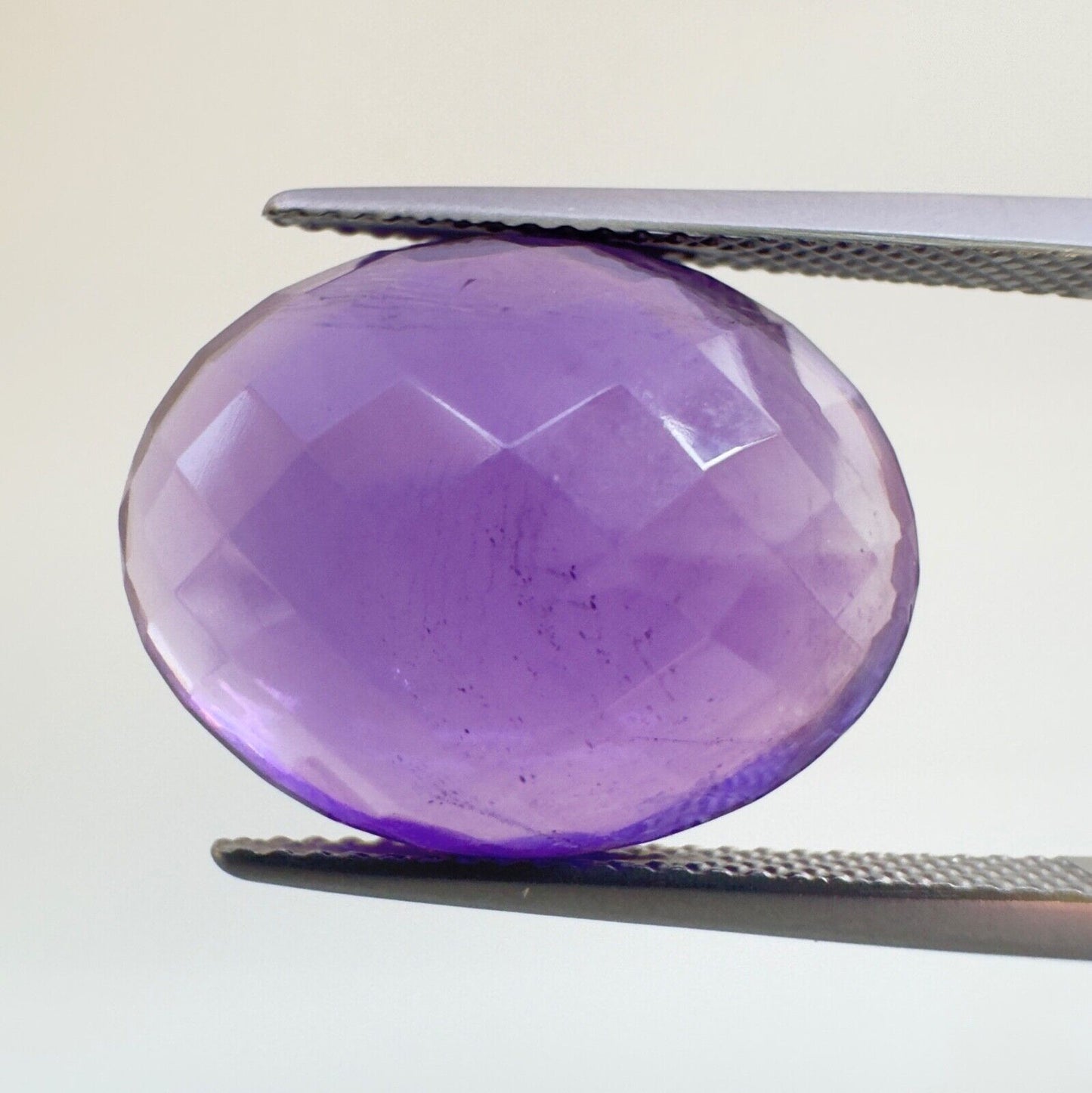 Amethyst Purple Oval Cut Faceted 18.6 x 14.6 mm 15.12 Carat With Inclusions