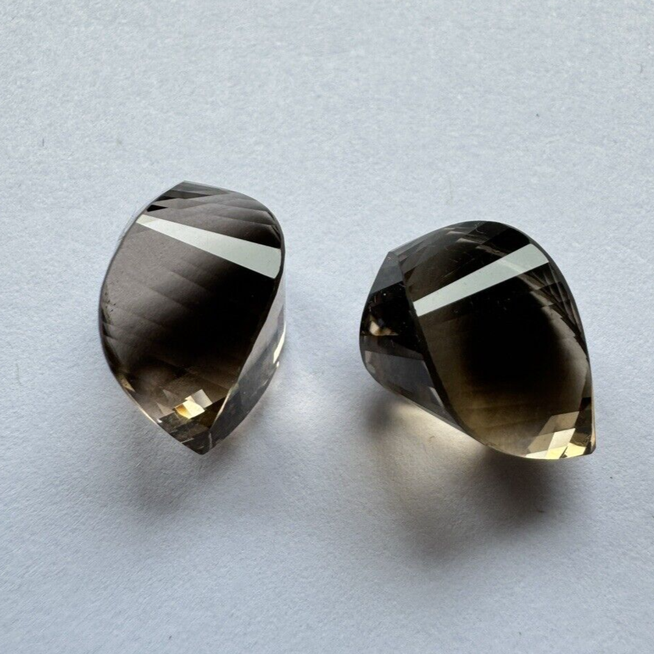 Multifaceted Smoky Quartz Pair in Fancy Cut 15,40mm x 12,23mm 21,14cts