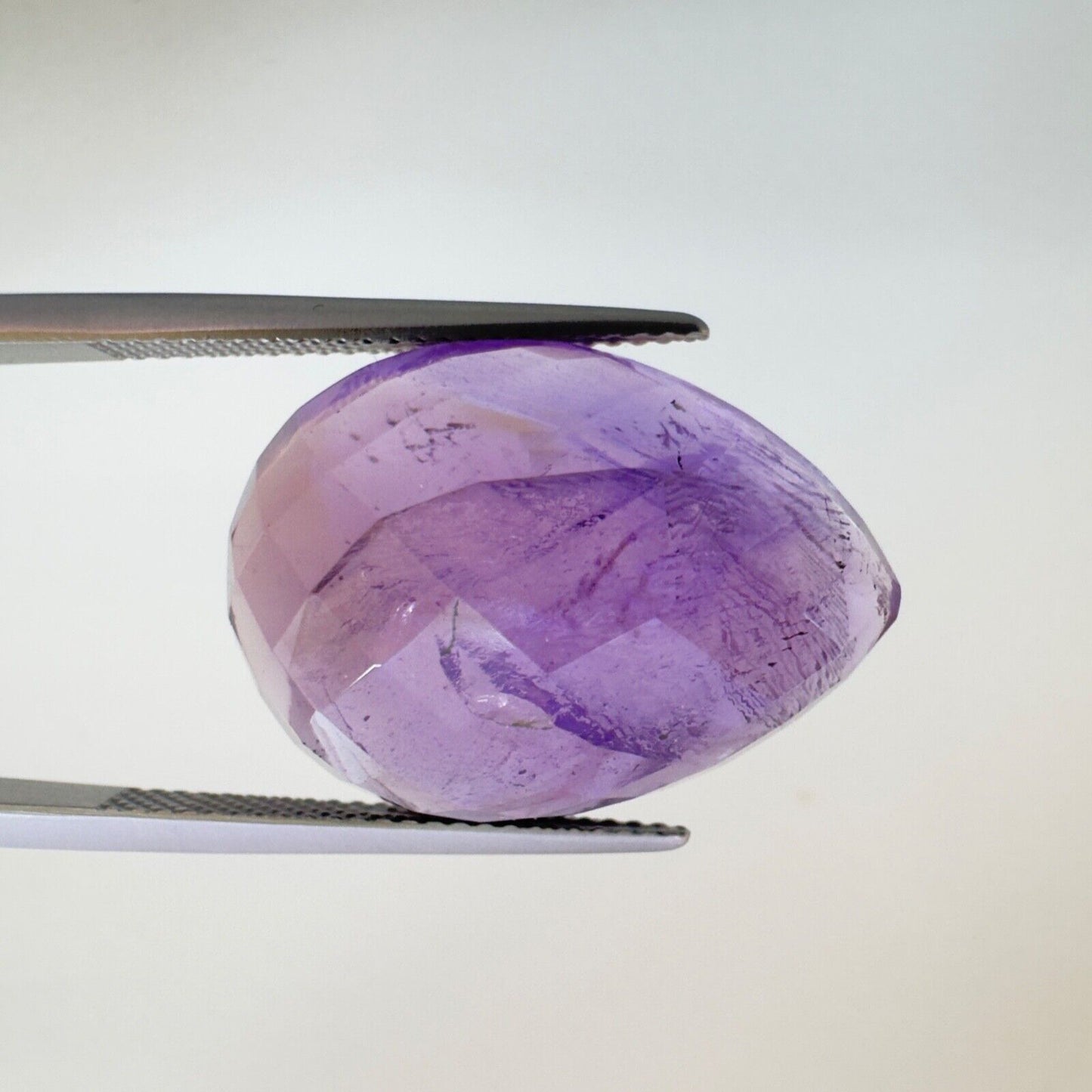 Amethyst Purple Drop Cut Faceted 22.3x16.2mm 22.14 Carat With Inclusions