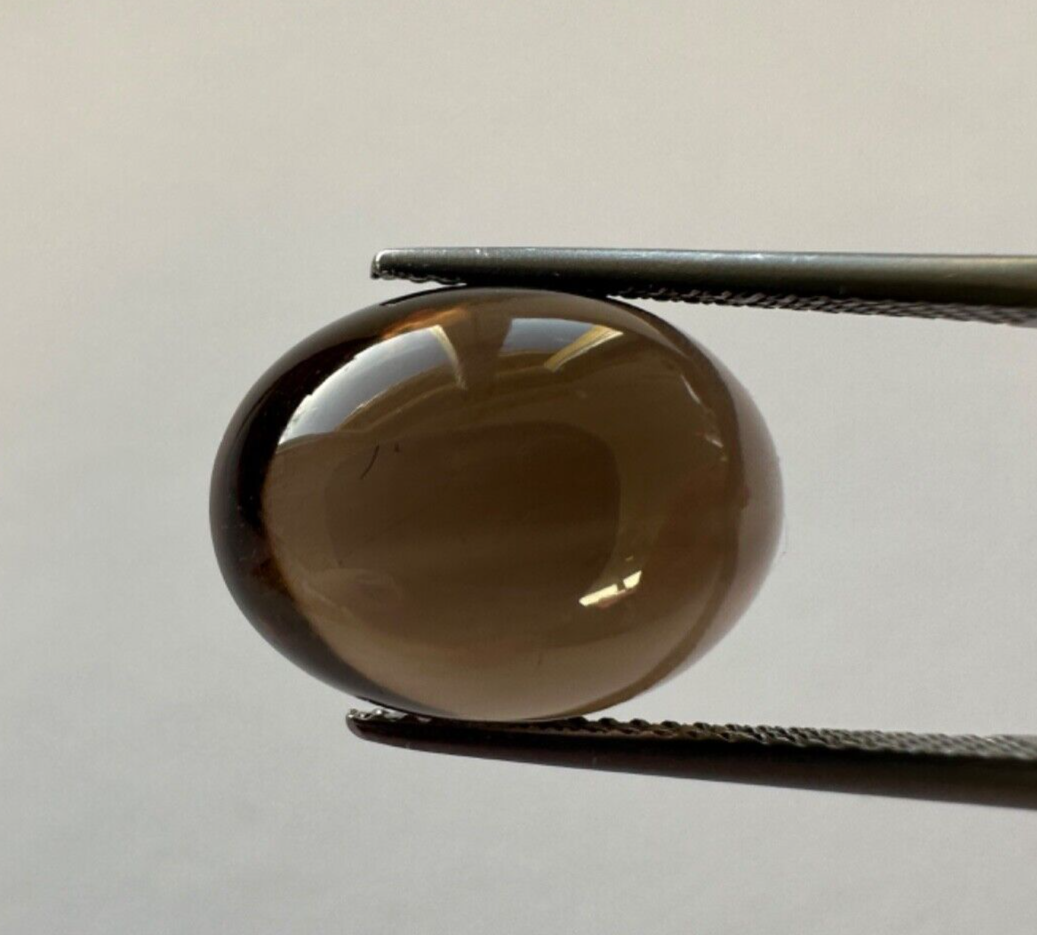 Magical smoked quartz cabochon 16mm x 12 mm 11,36cts