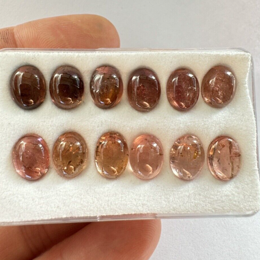 Diversity of nature In 12 tourmaline stones approx. 9mm x 7mm / 1,34cts -2,67cts