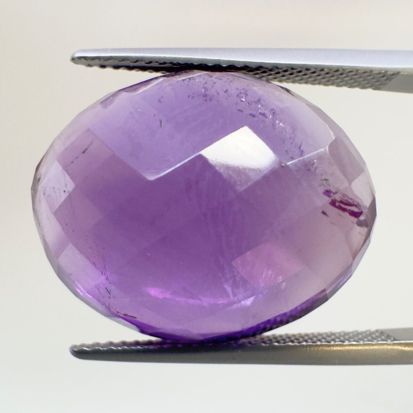 Amethyst Purple Oval Cut Faceted 18.6 x 14.6 mm 15.12 Carat With Inclusions