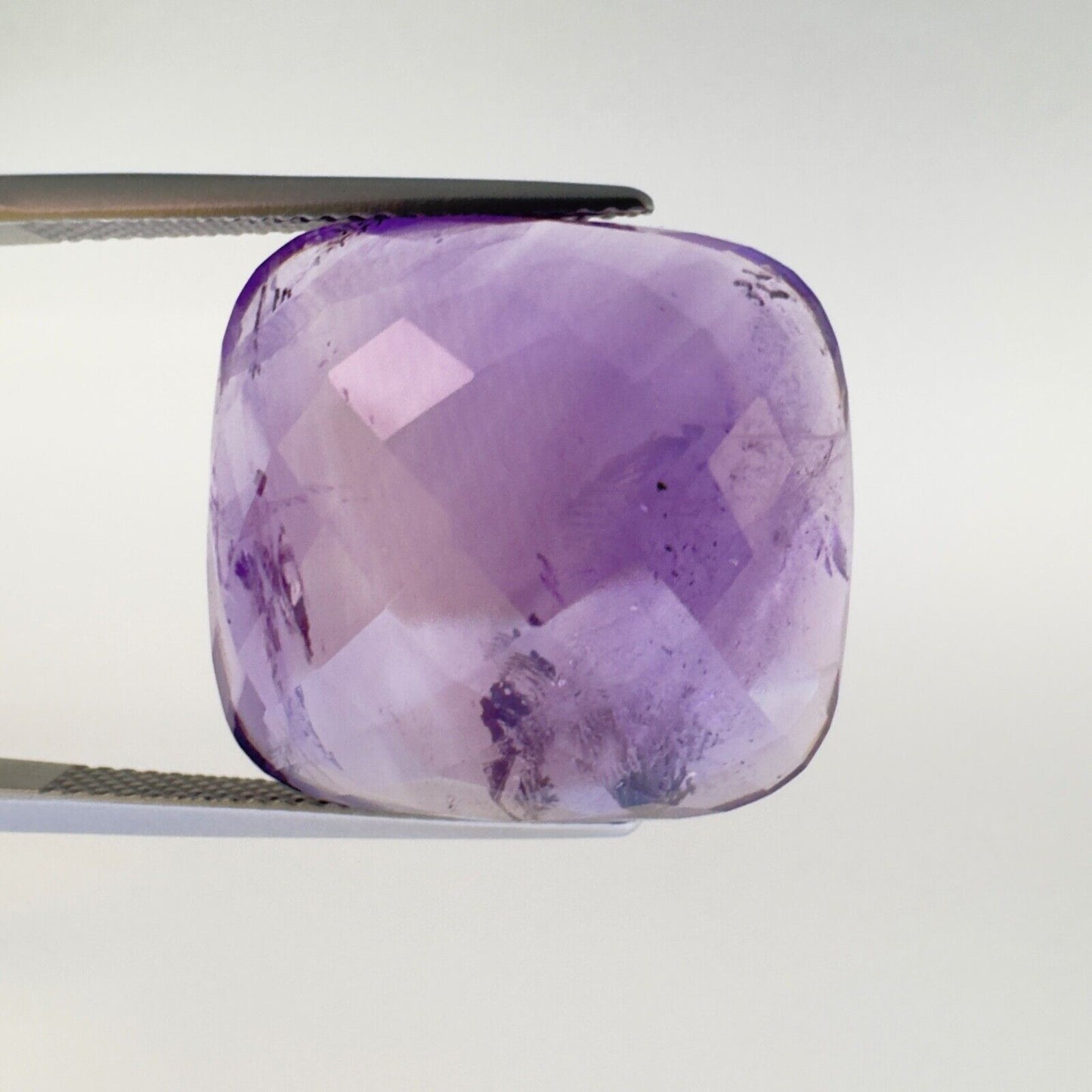 Amethyst Purple Cushion Cut Faceted 21 x 19,5 mm 31,77 Carat With Inclusions