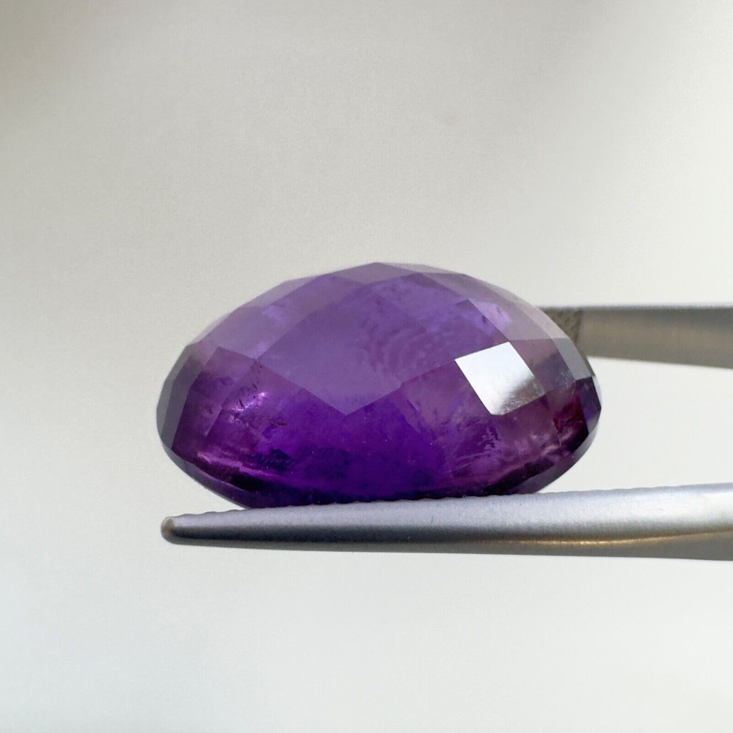 Amethyst Purple Oval Cut Faceted 18.6 x 14.6 mm 15.12 Carat With Inclusions