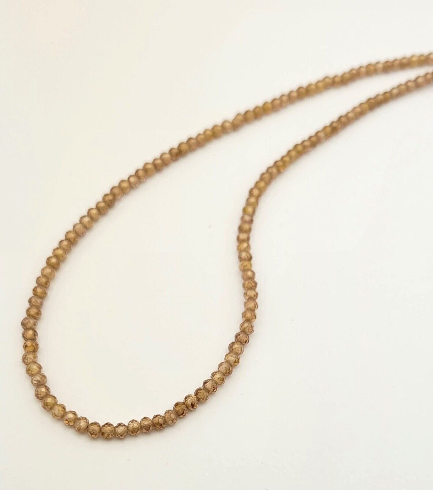 1 strand AAA+ Brown Zikonia Faceted Roundet 3.5 - 3.6 mm Beads 43 Cm