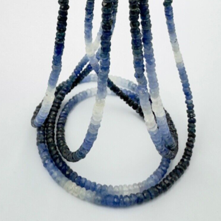 Zarte Saphirperlen facettiert mit Farbverlauf dunkelblau - hellblau 59,09cts,