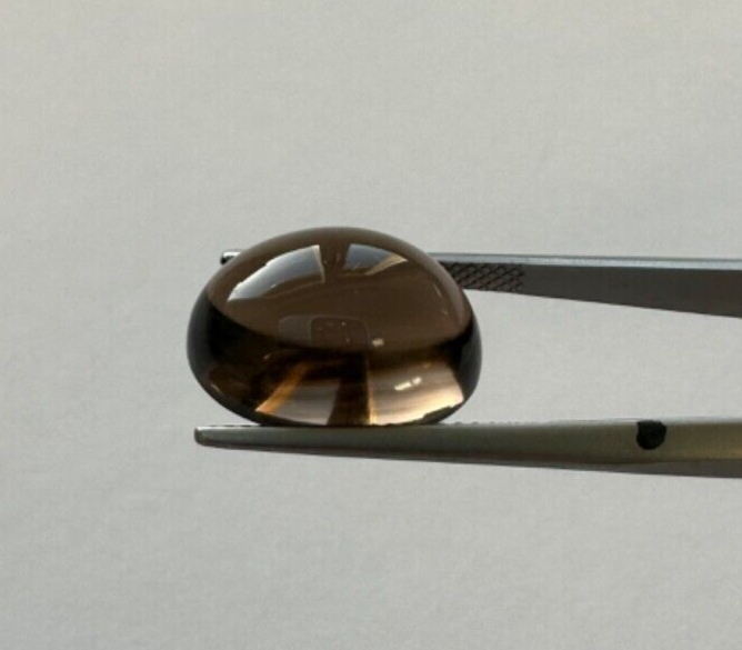 Magical smoked quartz cabochon 16mm x 12 mm 11,36cts