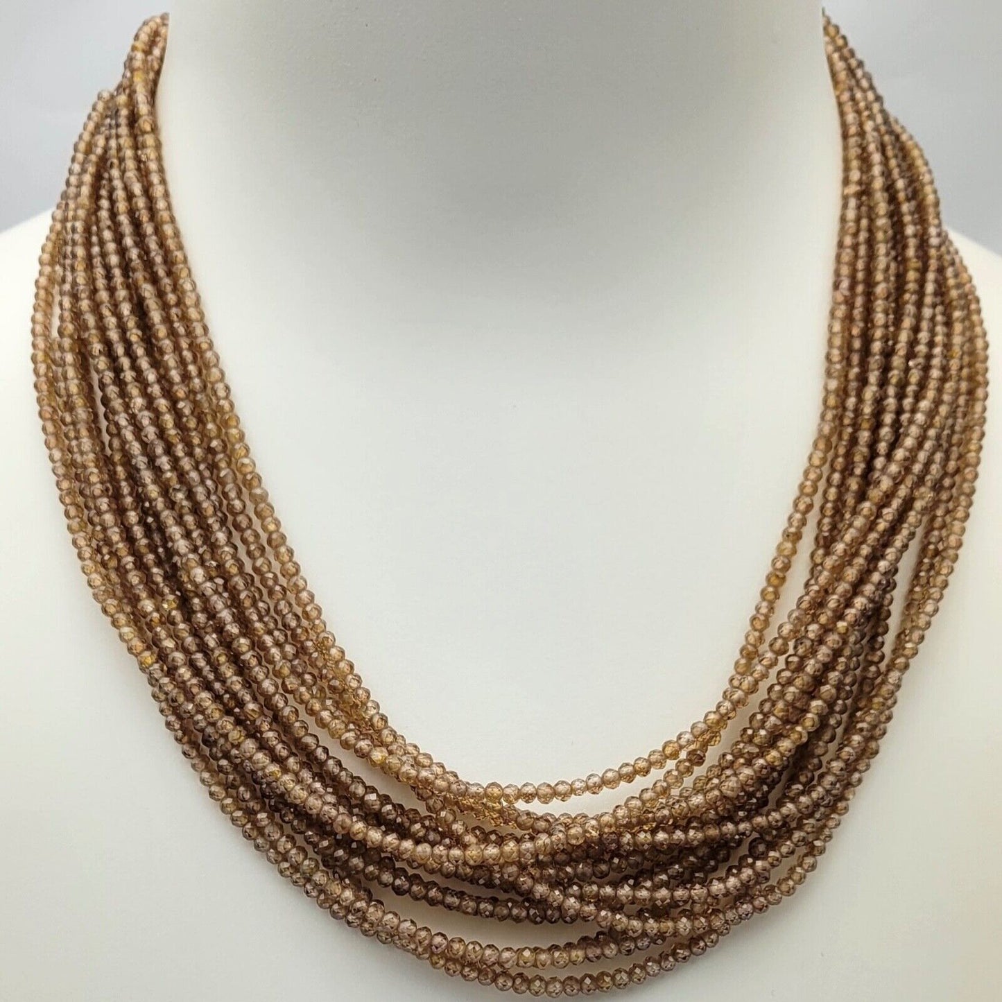1 strand AAA+ Brown Zikonia Faceted Roundabout 3.7 mm Beads 43 Cm