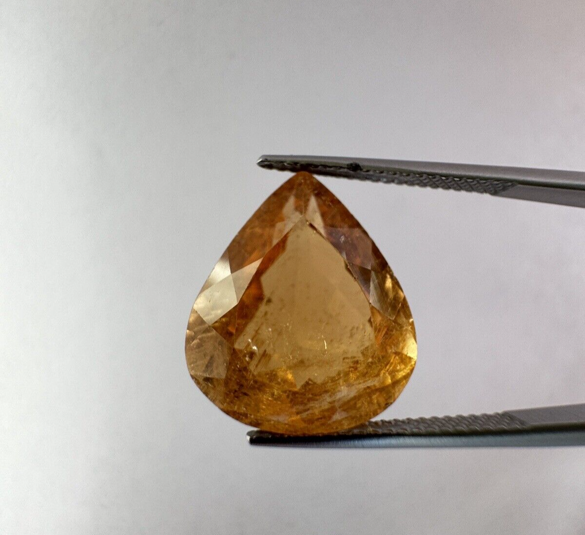 Warm orange tourmaline 16,02mm x 13,81mm 11,14cts