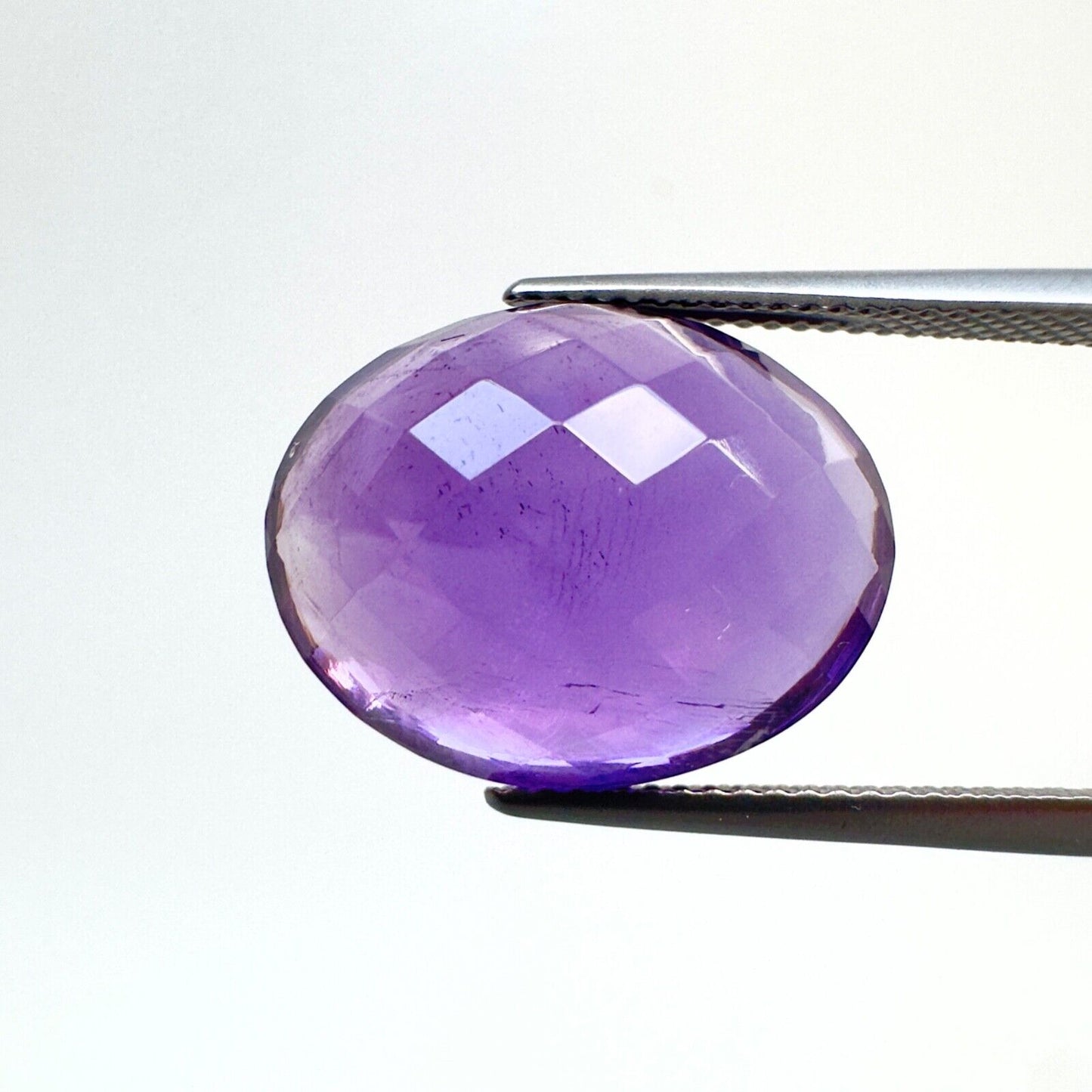 Amethyst Purple Oval Cut Faceted 18.6 x 14.6 mm 15.12 Carat With Inclusions