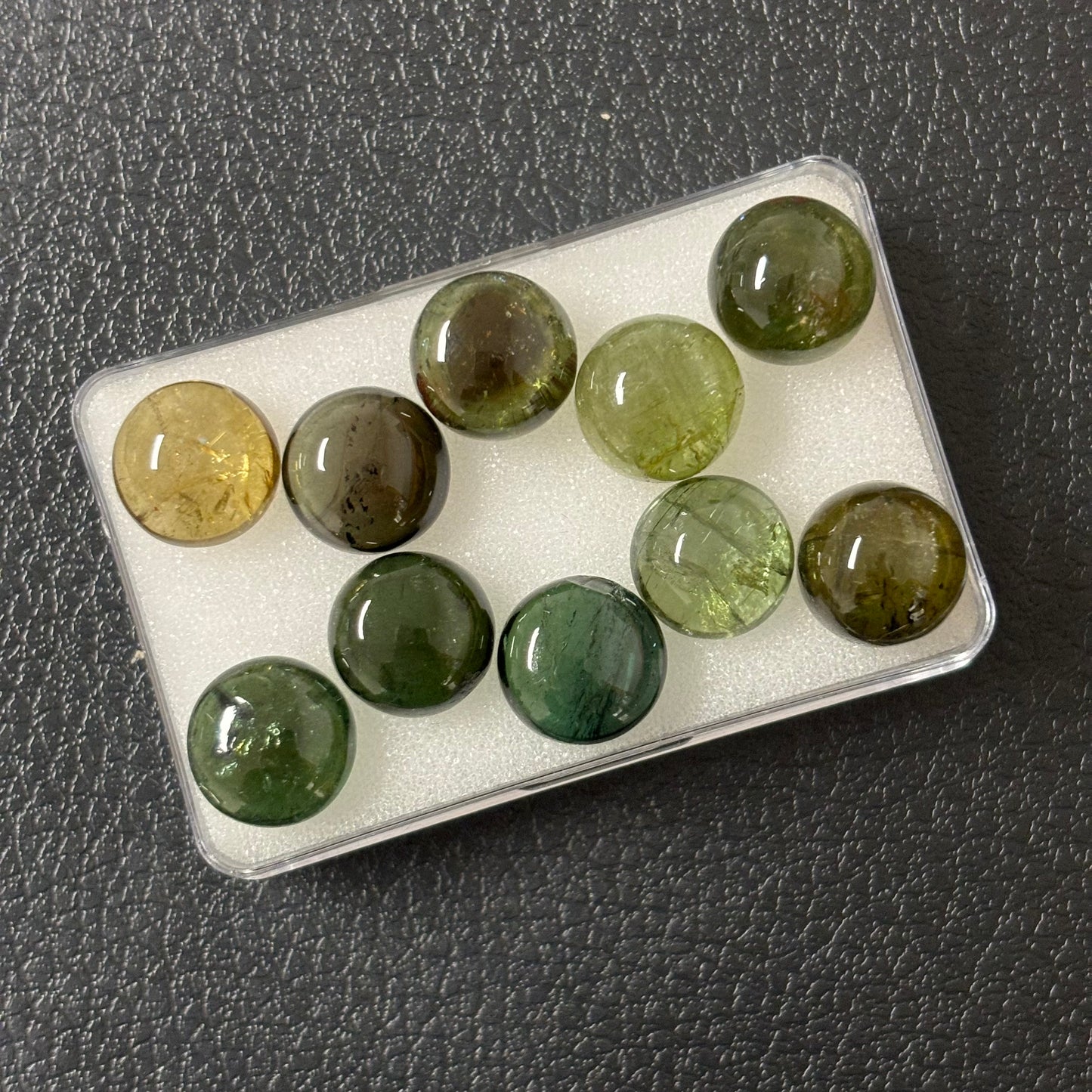 Tourmaline Round Cabochon With Inclusions Approx. 11 mm 6,16 Cts.