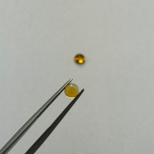 Tourmaline's vibrant golden hues - Pair : 0,84cts round