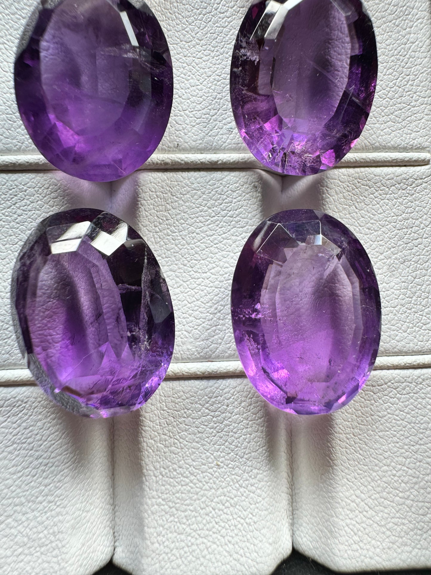 Amethyst Oval Faceted Gemstones With Deep Purple And Inclusions