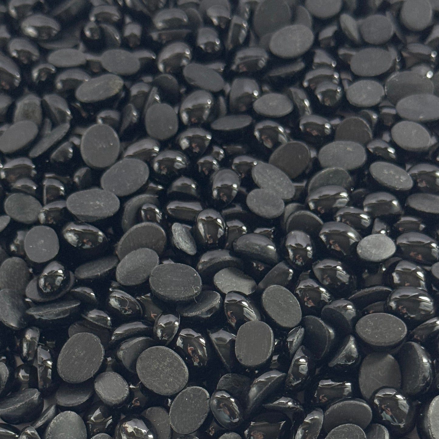 Black Sunstone Cabochons 20g per bag In different sizes 0.7 - 1,2mm -