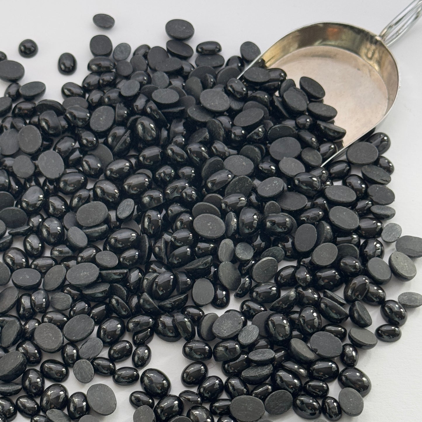 Black Sunstone Cabochons 20g per bag In different sizes 0.7 - 1,2mm -