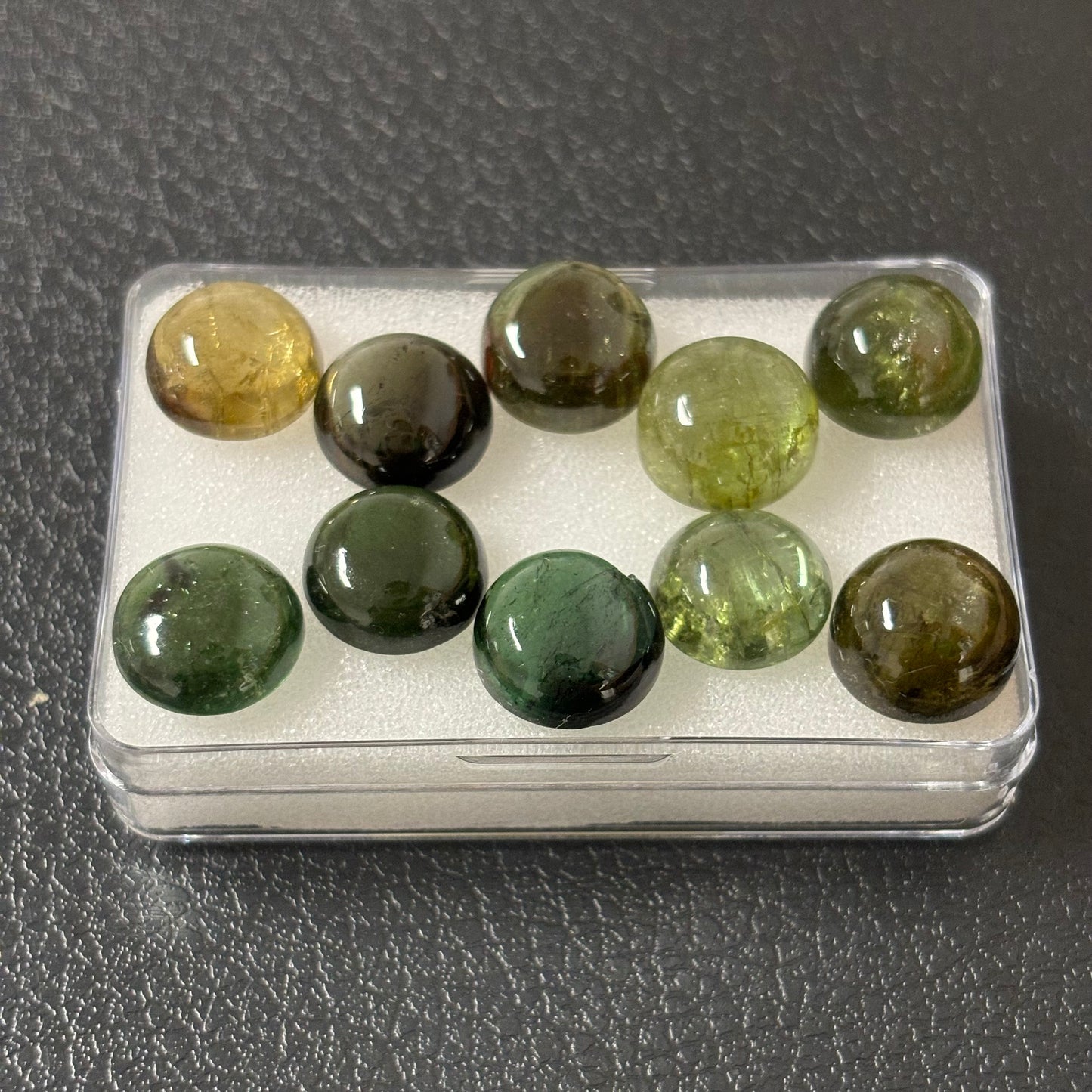 Tourmaline Round Cabochon With Inclusions Approx. 11 mm 6,16 Cts.