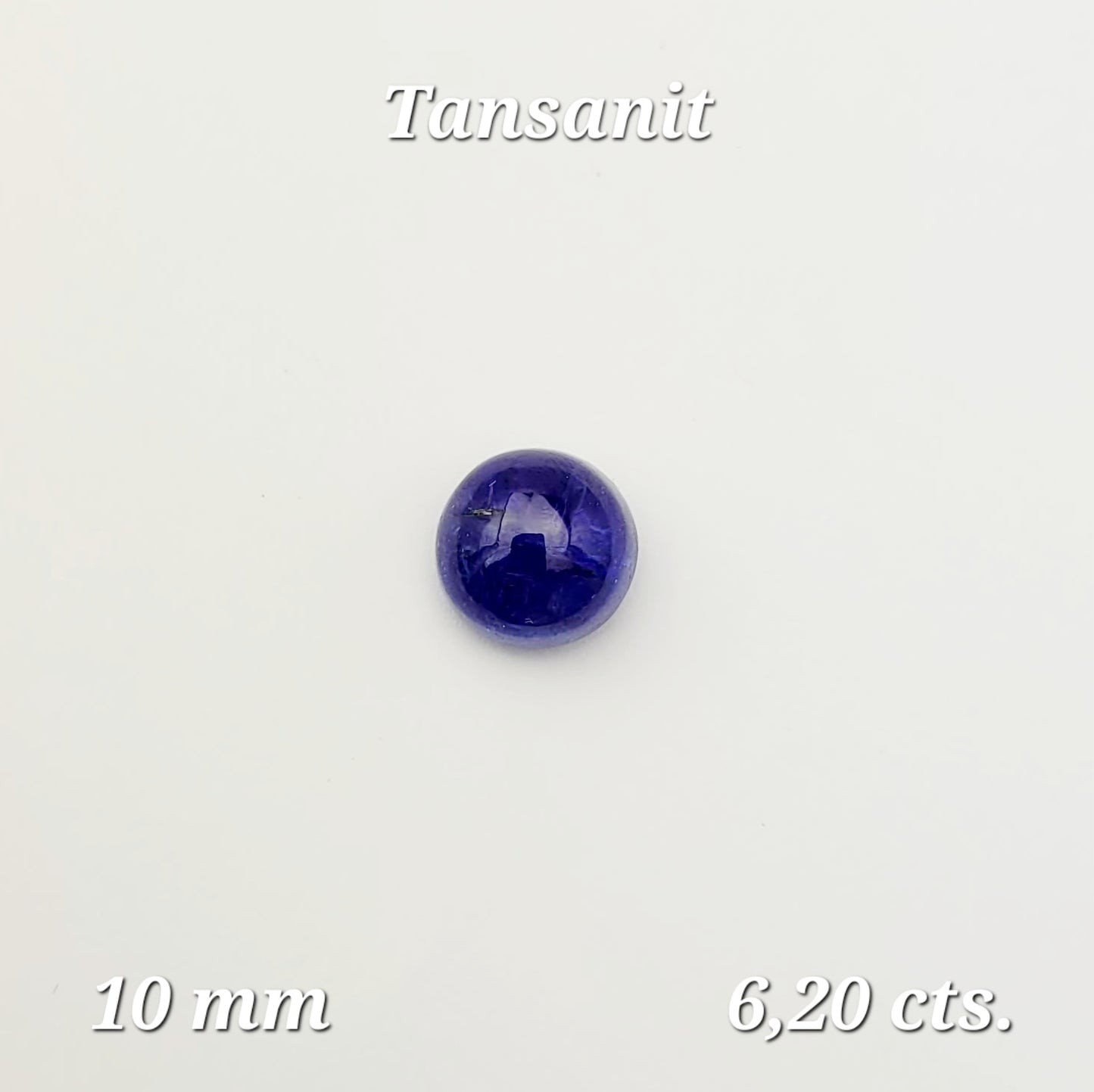 Fein gearbeiteter dunkelblauer Tansanit-Cabochon, rund