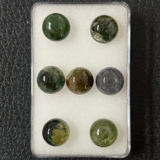 Tourmaline round cabochon with inclusions approx. 10 mm 4.56 Cts.