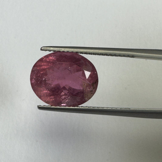 Pink Tourmaline in a stunning oval shape -fac. with beautiful inclusions