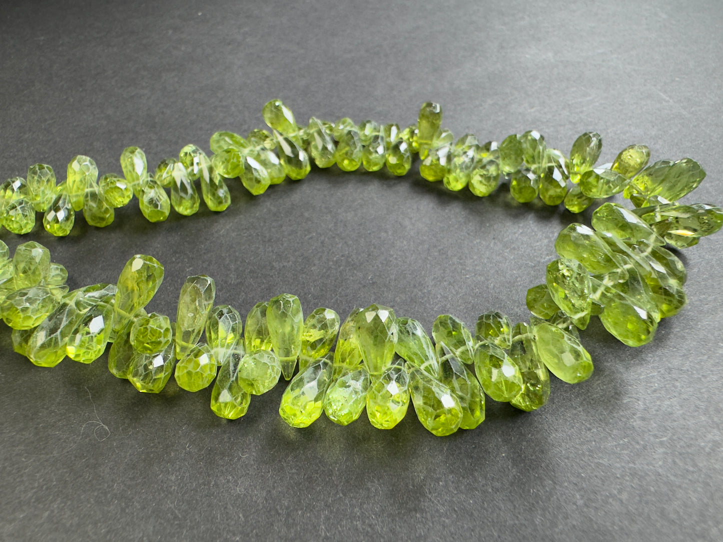 Fresh Green Peridot Beads 42cm , Faceted Drop 335,16cts