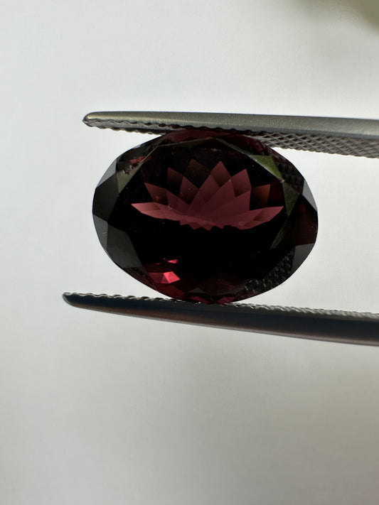 EB001314 Purple-red Tourmaline, oval, mixed cut, 7.24 cts, 13.3x10.4x8.1mm