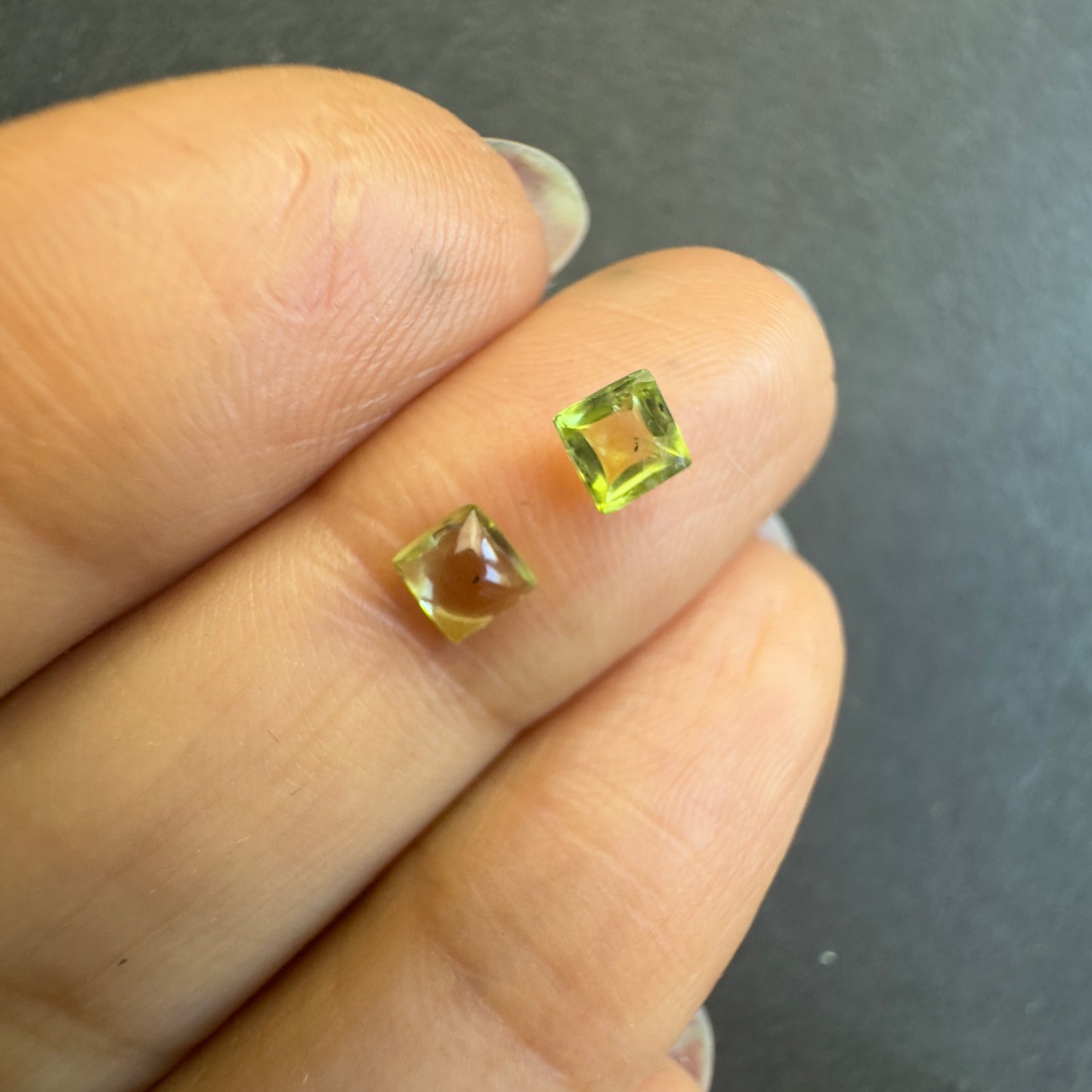Peridot pair, square cabochons, approx. 4.0x3.9mm & 3.8x3.7mm, 0.60cts