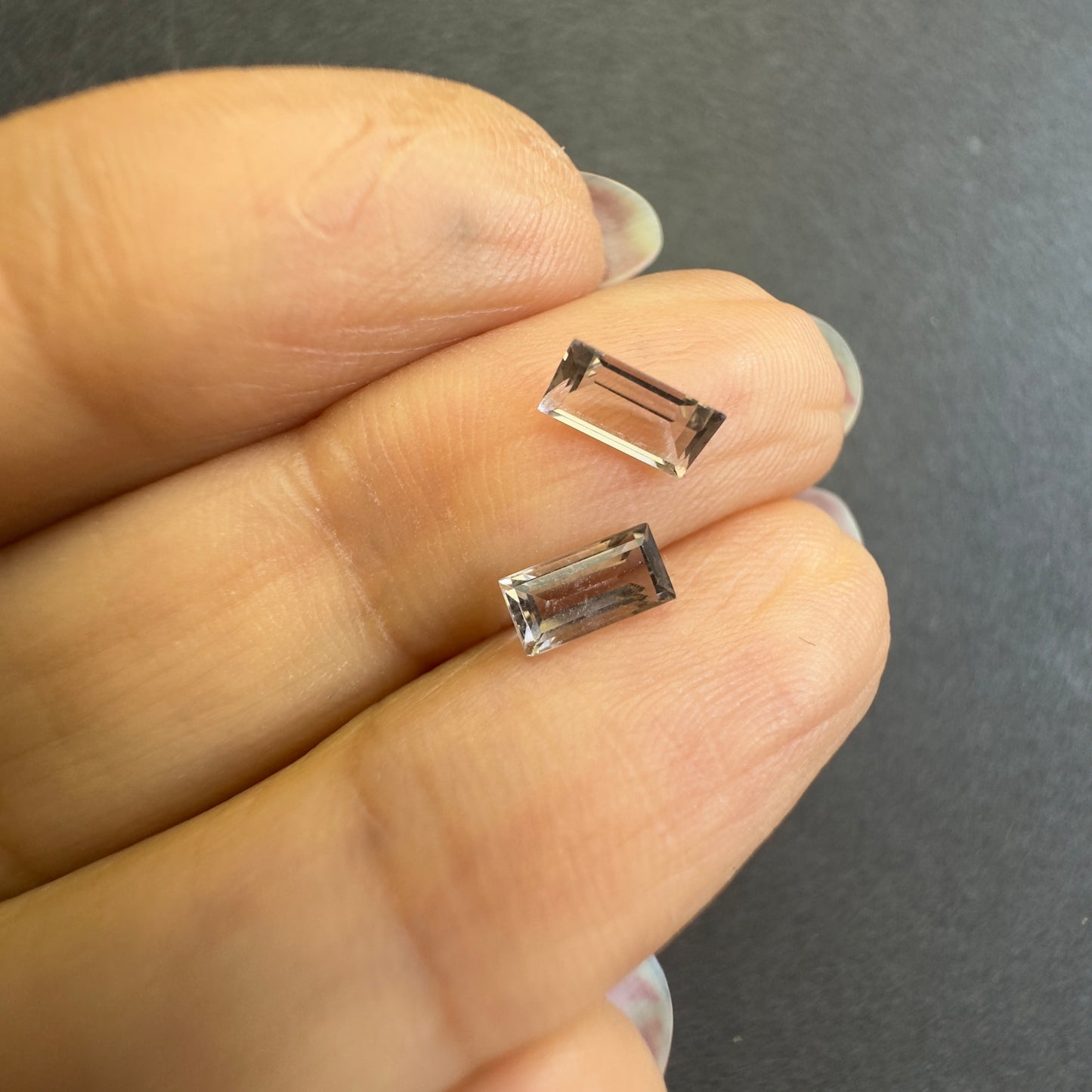 Smokey Quartz Pair, Emerald Cut, both approx. 5.9x3.0mm, 0.70cts