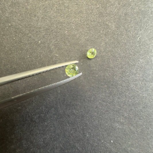 Peridot round pair, approx. 3.3mm diameters, 0.30cts