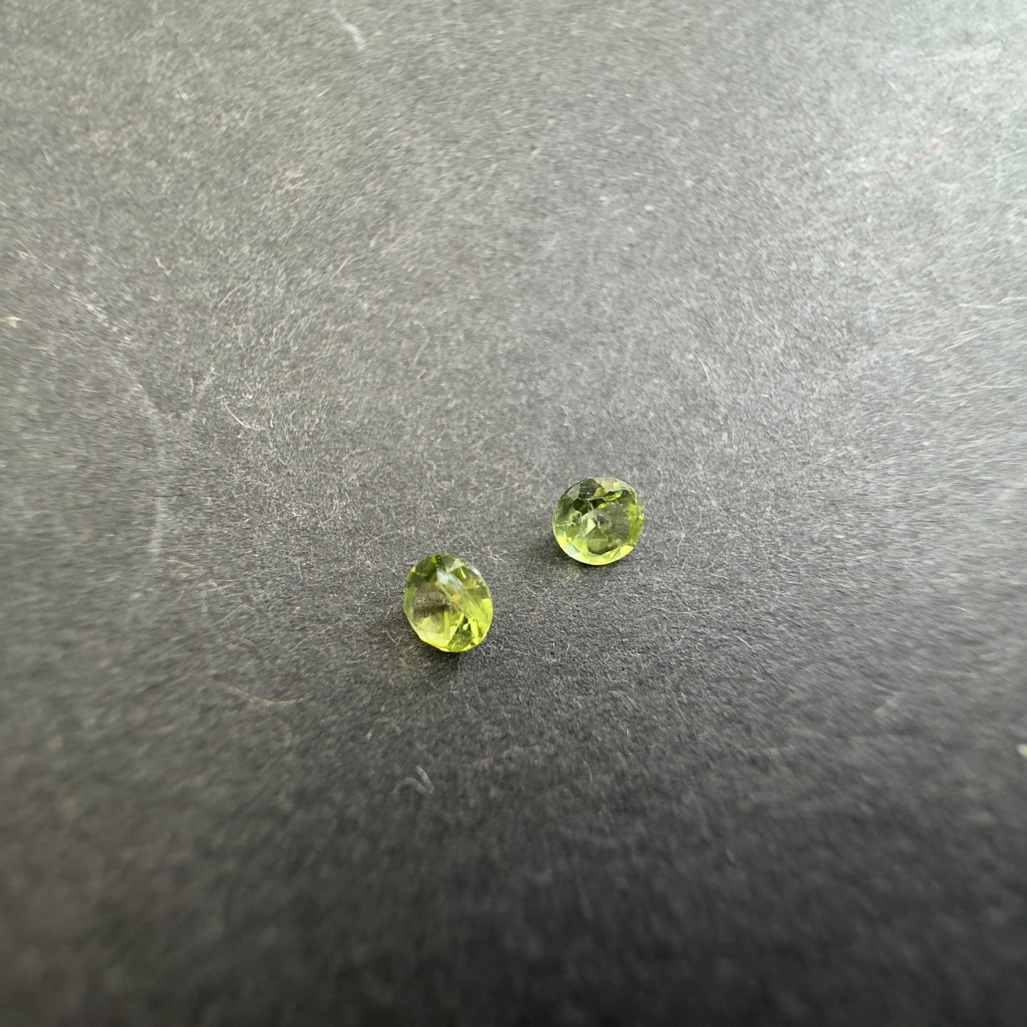 Peridot round pair, approx. 3.2mm&3.3mm diameters, 0.28cts