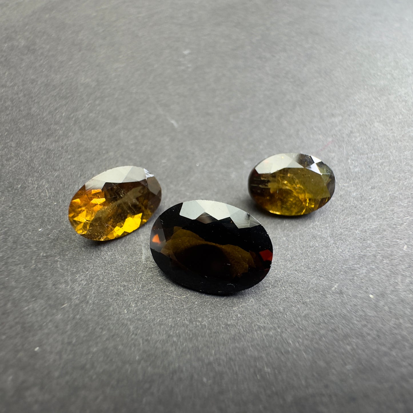 Irresistible Allure of our Intense Dark Oval Faceted Tourmaline